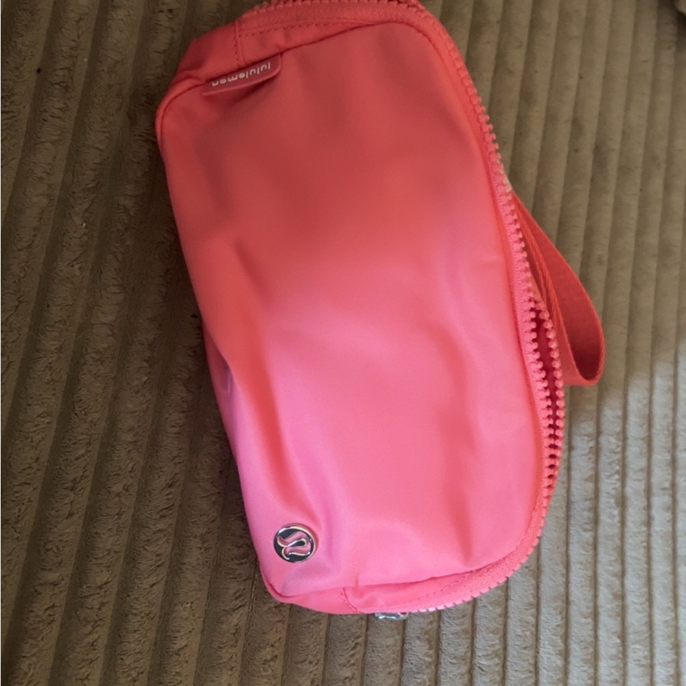 Lululemon 1L pink coral cross body bag NWT